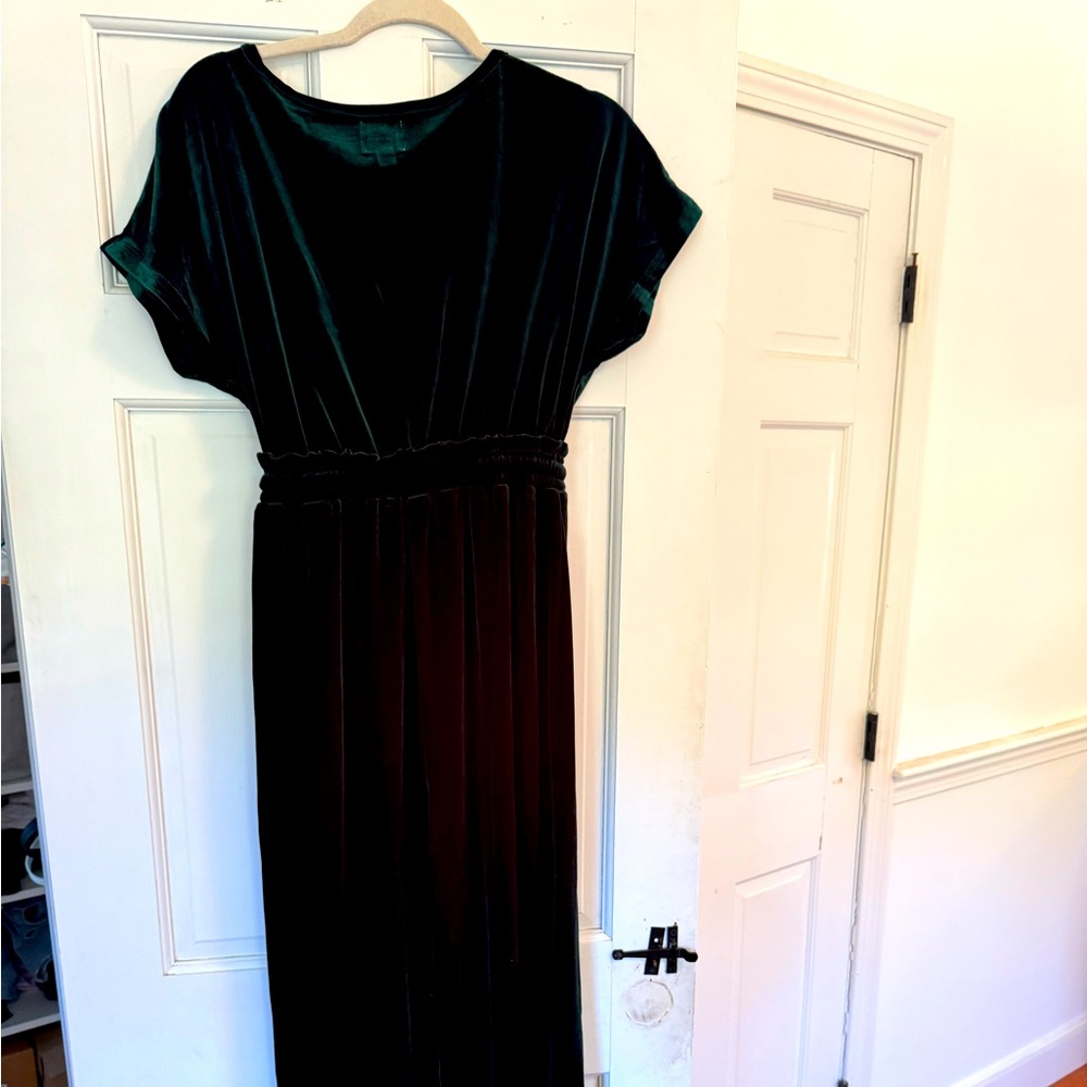Green velvet women’s jumper in size small.